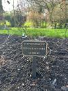 Small bronze plaque on a prong